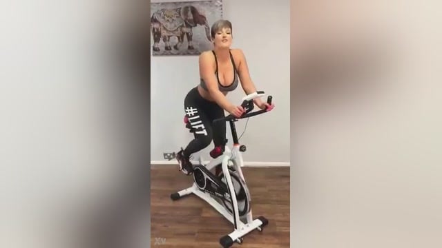 Blonde Babe Rides A Bike With A Dildo Stuck On It