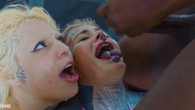 Two Tatted Anal Freaks Take Nine Cocks At Once